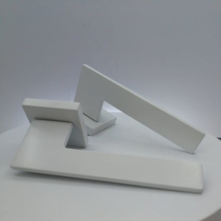 Klamka Blade biała szyld kwadratowy Corona