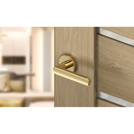 Klamka Icona slim mosiądz błyszczący PVD szyld okrągły Corona