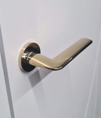 Klamka Stinger  KSR O G00 rozeta okrągła złota połysk Infinity Line