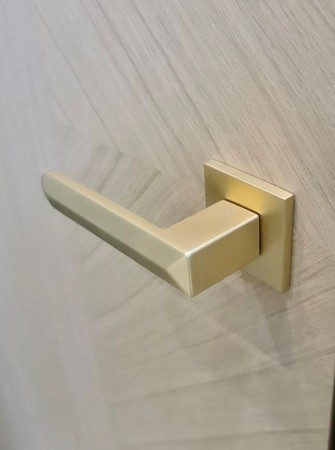 Klamka Bohema KBH MG00 rozeta kwadratowa złoty - mat Infinity Line