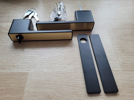 Klamka Milano MG00/B00 B szyld RT czarna/złota mat z pokrętłem Italian Design