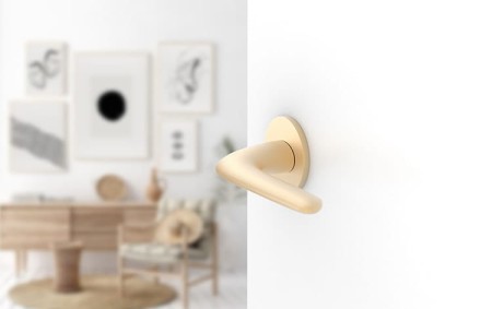 Klamka Moon Slim szyld płaski okrągły, mosiądz matowy Corona