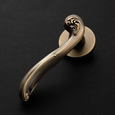 Klamka ERIS FIT cuero szyld okrągły VDS