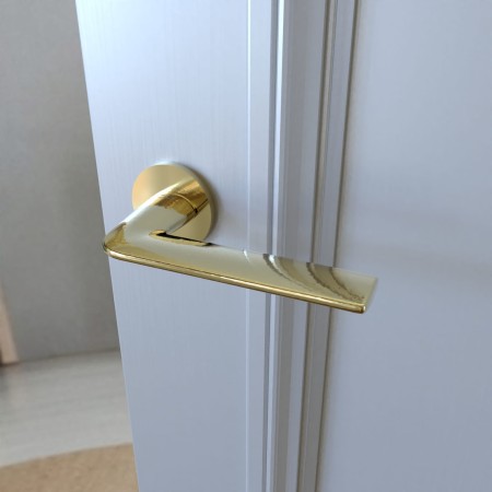 Klamka Stinger KSR O G00 rozeta okrągła złota połysk Infinity Line