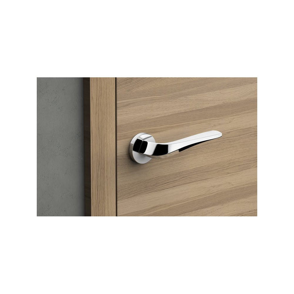 Klamka Flow chrom połysk szyld okrągły Corona